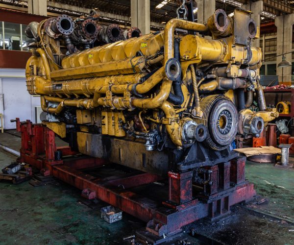 Locomotive diesel engine spare parts in a maintenance workshop Cylinder blocks, pistons, crankshafts, valves, exhaust pipes, etc.
